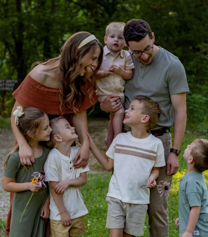 family coach laughing with family